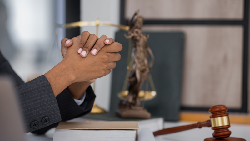 African American Lawyer woman working at office desk, concepts of law and legal services, law contract.