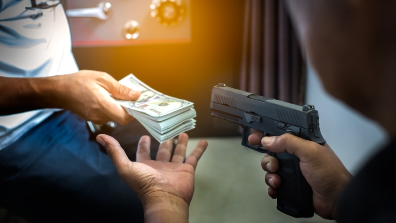 Armed robbers used the gun to robbery the money, Uses Gun in Armed Robbery, Armed robbers,